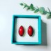 Coral lab created silver tone studded earring