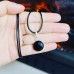 Faceted Black Agate round Pendant with a black cord