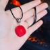 Red Coral round Pendant with a black cord