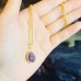 Amethyst round  gold tone plated pendant with a chain