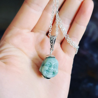 Burma Jade Laughing Buddha carving pendant with a silver tone chain