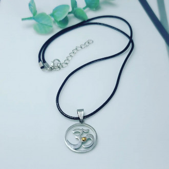 Om Silver Plexus pendant with a black cord