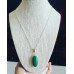 Malachite (lab created) oval silcer tone pendant with a chain
