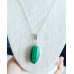 Malachite (lab created) oval silcer tone pendant with a chain