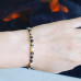 Faceted Agate gold tone bracelet 4 mm