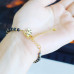Faceted Agate gold tone bracelet 4 mm